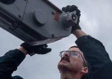 USS George Washington Sailors upload NATO Seasparrow Missile System