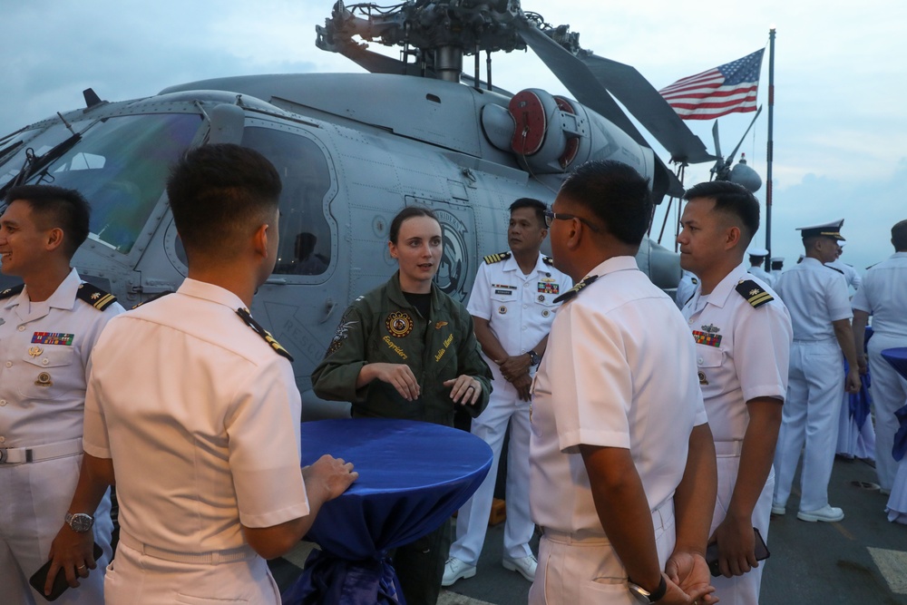 Sailors aboard the USS Howard hosts a reception as part of Sama Sama 2024