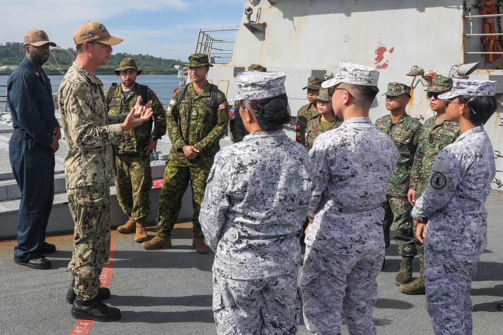 Sailors aboard USS Howard (DDG 83) conduct a shipboard tour for medical personnel during Sama Sama 2024 in Subic, Philippines