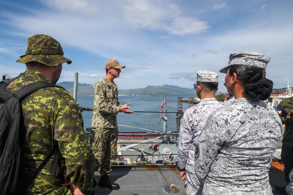 Sailors aboard USS Howard (DDG 83) conduct a shipboard tour for medical personnel during Sama Sama 2024 in Subic, Philippines