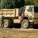 Guardsmen work together to clear debris in Bumpus Cove, Tennessee