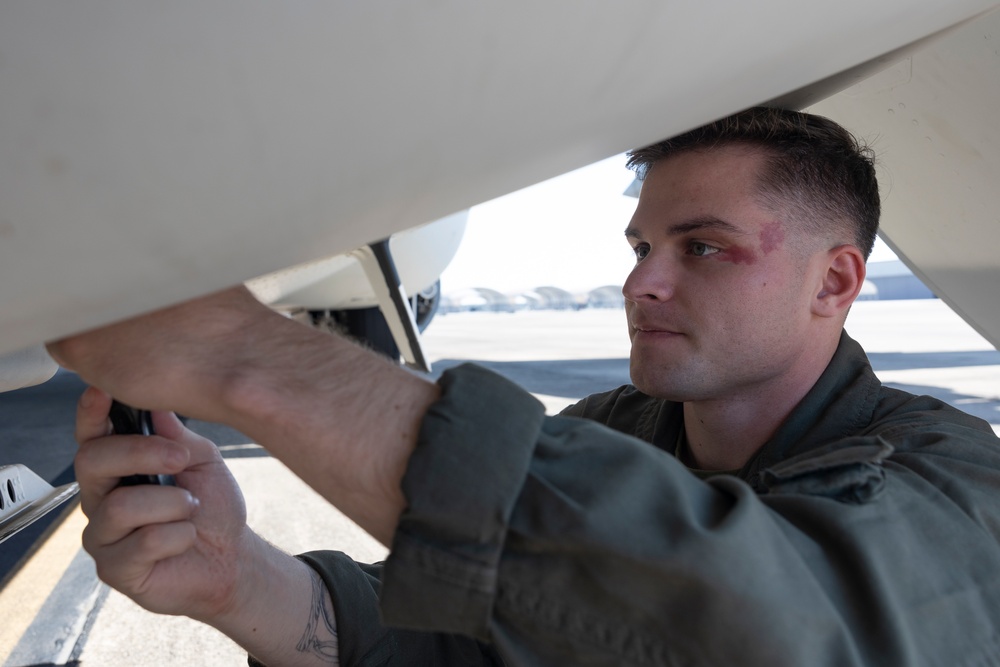 U.S. Marines with Marine Aerial Refueler Transport Squadron (VMGR) 252 conduct routine maintenance