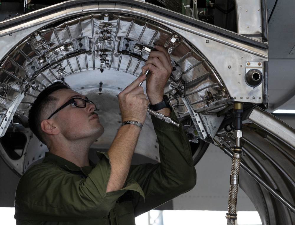 U.S. Marines with Marine Aerial Refueler Transport Squadron (VMGR) 252 conduct routine maintenance