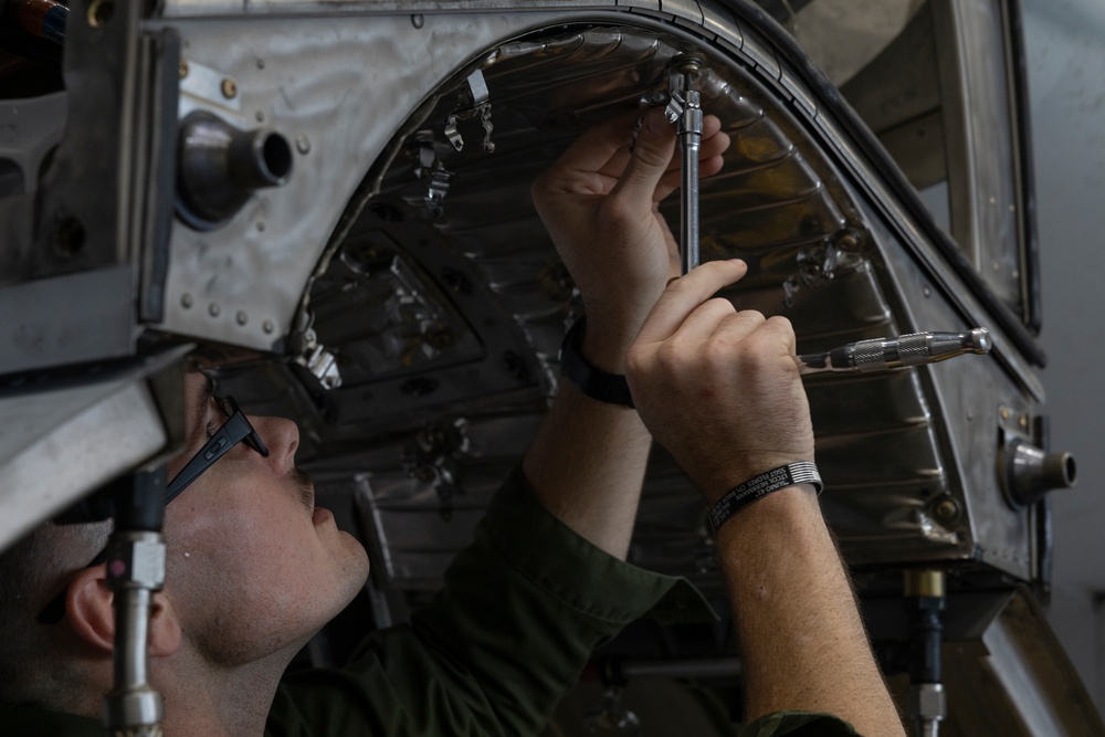 U.S. Marines with Marine Aerial Refueler Transport Squadron (VMGR) 252 conduct routine maintenance