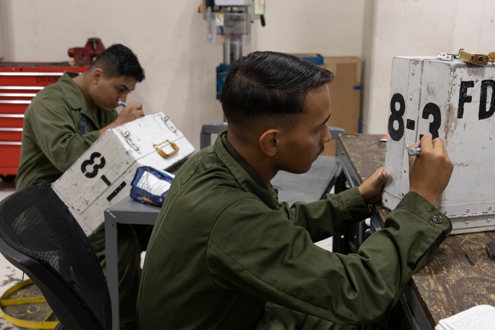 U.S. Marines with Marine Aerial Refueler Transport Squadron (VMGR) 252 conduct routine maintenance