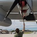 U.S. Marines with Marine Aerial Refueler Transport Squadron (VMGR) 252 conduct routine maintenance