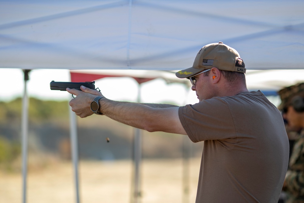 USS Tripoli Sailors compete in a shooting compitition