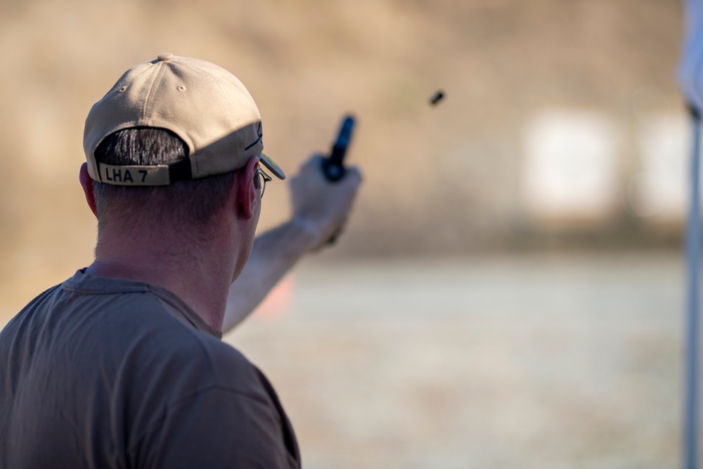 USS Tripoli Sailors compete in a shooting competition