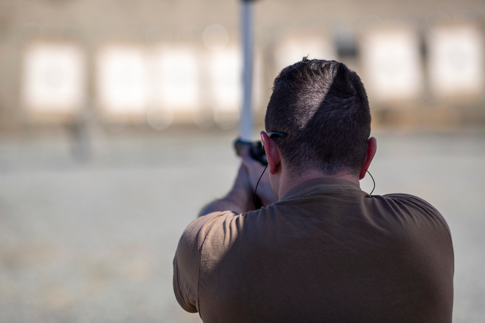 USS Tripoli Sailors compete in a shooting competition