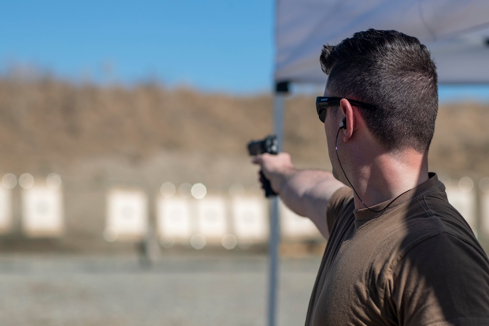 USS Tripoli Sailors compete in a shooting compitition