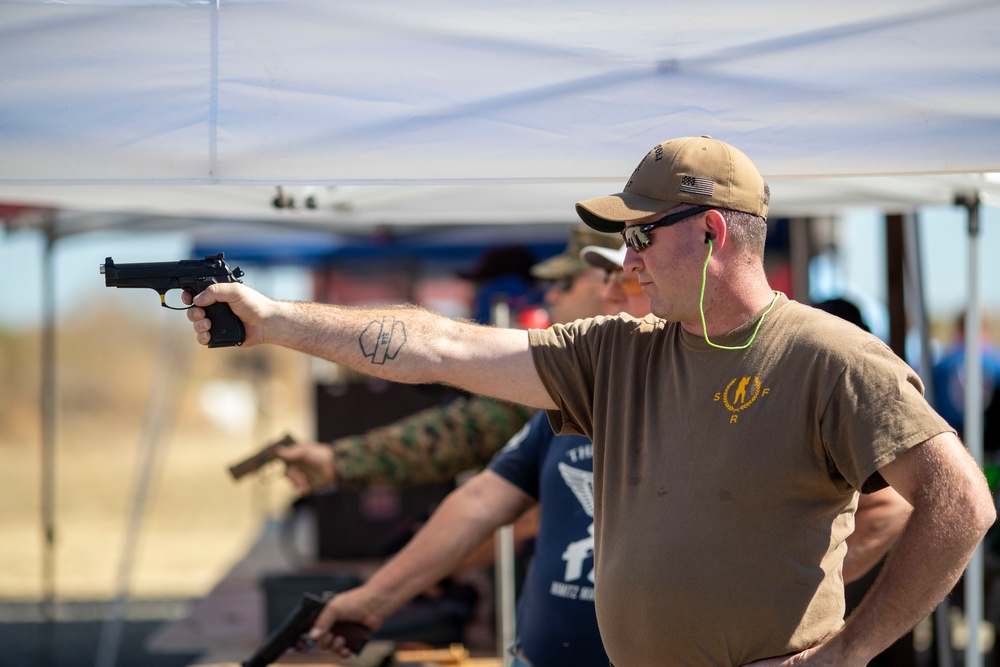 USS Tripoli Sailors compete in a shooting compitition