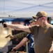 USS Tripoli Sailors compete in a shooting compitition