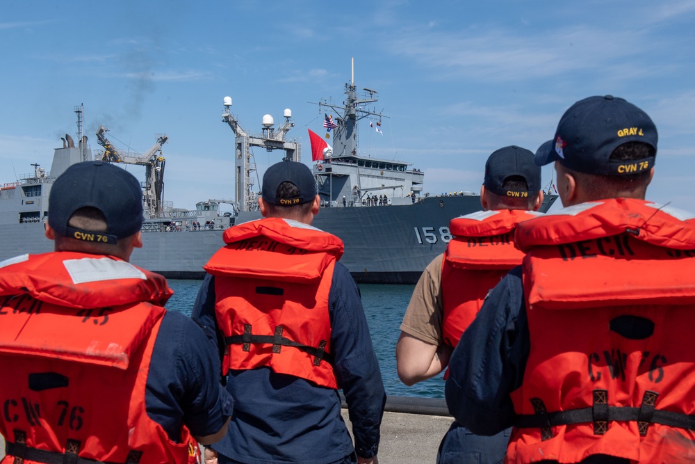 USS Ronald Reagan (CVN 76) Sailors assist in mooring Peruvian supply ship