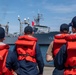 USS Ronald Reagan (CVN 76) Sailors assist in mooring Peruvian supply ship