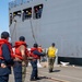 USS Ronald Reagan (CVN 76) Sailors assist in mooring Peruvian supply ship