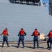 USS Ronald Reagan (CVN 76) Sailors assist in mooring Peruvian supply ship