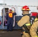 USS Ronald Reagan (CVN 76) Sailors conduct training during a general quarters drill