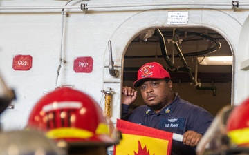 USS Ronald Reagan (CVN 76) Sailors conduct training during a general quarters drill