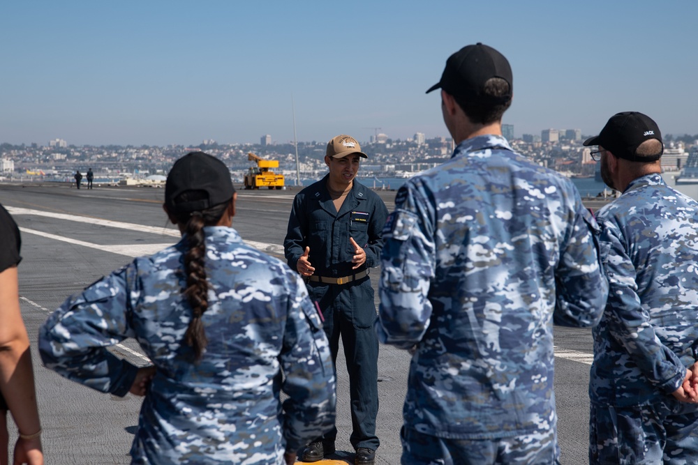 USS Ronald Reagan (CVN 76) hosts a tour for Australian air force service members