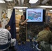 Military personnel from participating nations attend a medical presentation aboard the USS Howard during Sama Sama 2024