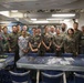 Military personnel from participating nations attend a medical presentation aboard the USS Howard during Sama Sama 2024