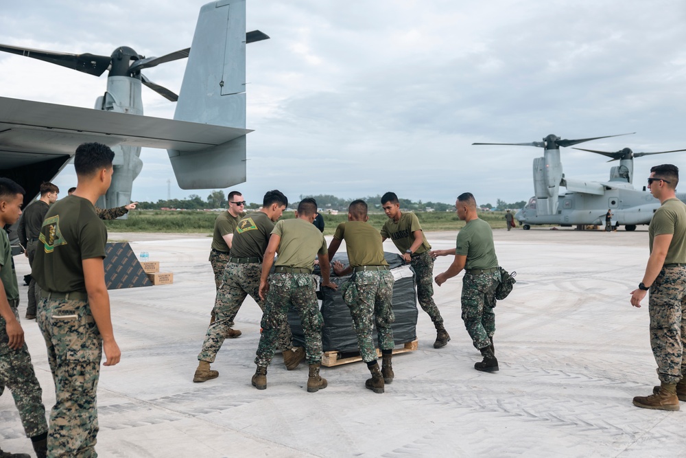 U.S., Philippine Marines load MV-22 Ospreys in Laoag to Support Relief Efforts Alongside Philippine Allies