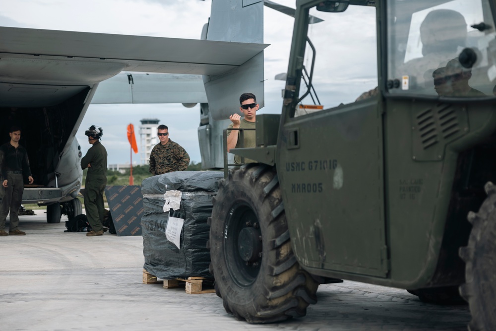 U.S., Philippine Marines load MV-22 Ospreys in Laoag to Support Relief Efforts Alongside Philippine Allies