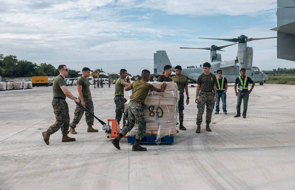 U.S., Philippine Marines load MV-22 Ospreys in Laoag to Support Relief Efforts Alongside Philippine Allies