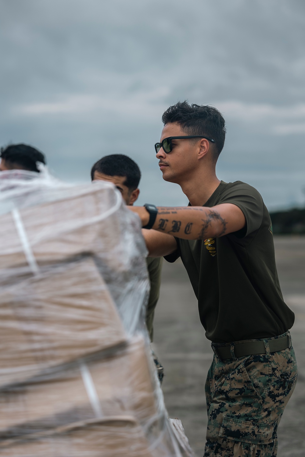 U.S., Philippine Marines load MV-22 Ospreys in Laoag to Support Relief Efforts Alongside Philippine Allies