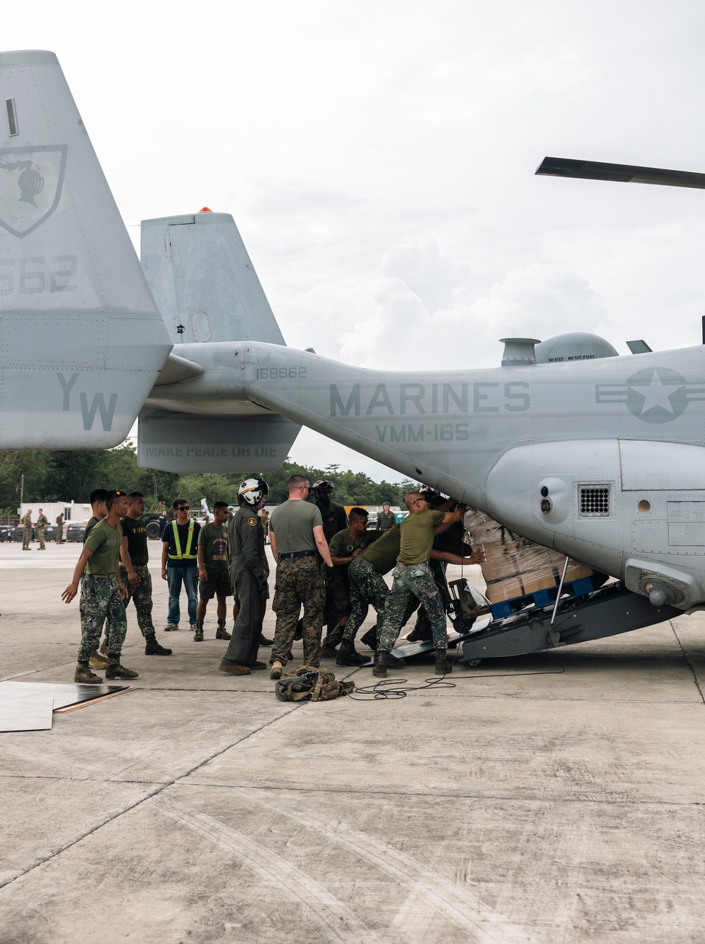 U.S., Philippine Marines load MV-22 Ospreys in Laoag to Support Relief Efforts Alongside Philippine Allies