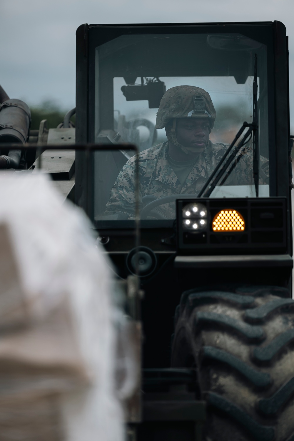 U.S., Philippine Marines load MV-22 Ospreys in Laoag to Support Relief Efforts Alongside Philippine Allies