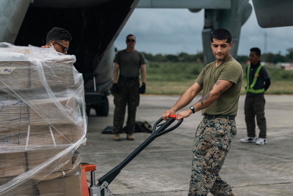 U.S., Philippine Marines load MV-22 Ospreys in Laoag to Support Relief Efforts Alongside Philippine Allies