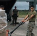 U.S., Philippine Marines load MV-22 Ospreys in Laoag to Support Relief Efforts Alongside Philippine Allies