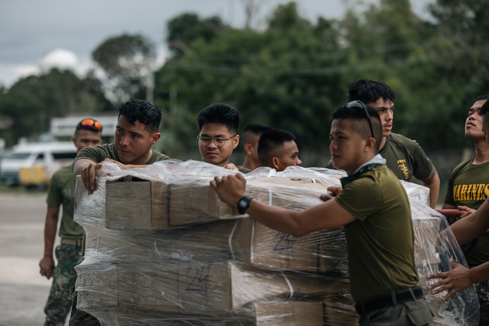 U.S., Philippine Marines load MV-22 Ospreys in Laoag to Support Relief Efforts Alongside Philippine Allies