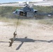 Multi-Purpose Canines Conduct Amphibious and Aerial Fast-Roping Training