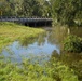 U.S. Army Corps of Engineers and South Florida Water Management work tirelessly to set up a pump system at Medard Reservoir to aid the flow of water to prevent flooding following Hurricane Milton on Oct. 10, 2024.
