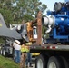 U.S. Army Corps of Engineers and South Florida Water Management work tirelessly to set up a pump system at Medard Reservoir to aid the flow of water to prevent flooding following Hurricane Milton on Oct. 10, 2024.