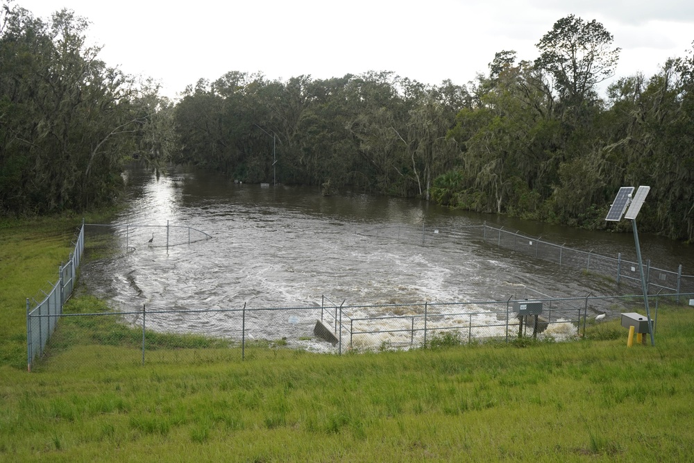 U.S. Army Corps of Engineers and South Florida Water Management work tirelessly to set up a pump system at Medard Reservoir to aid the flow of water to prevent flooding following Hurricane Milton on Oct. 10, 2024.
