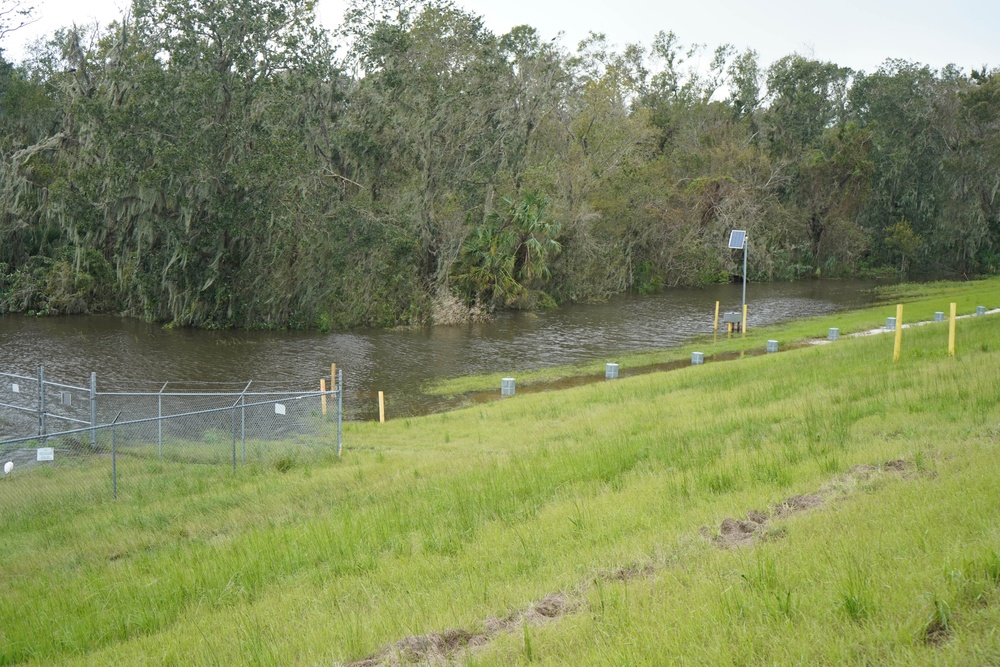U.S. Army Corps of Engineers and South Florida Water Management work tirelessly to set up a pump system at Medard Reservoir to aid the flow of water to prevent flooding following Hurricane Milton on Oct. 10, 2024.