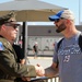 Army Reserve Soldier and country music star Craig Morgan performs the National Anthem alongside the 313th Army Band at the YellaWood 500