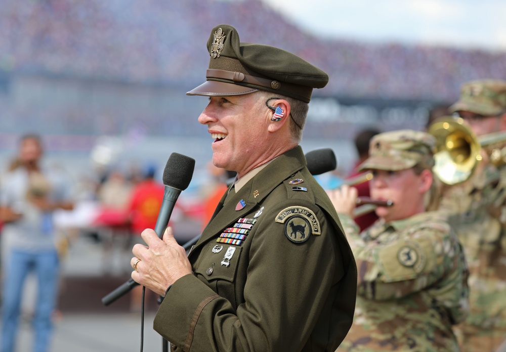 Army Reserve Soldier and country music star Craig Morgan performs the National Anthem alongside the 313th Army Band at the YellaWood 500