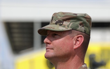 Army Reserve Soldier and country music star Craig Morgan performs the National Anthem alongside the 313th Army Band at the YellaWood 500