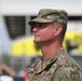 Army Reserve Soldier and country music star Craig Morgan performs the National Anthem alongside the 313th Army Band at the YellaWood 500