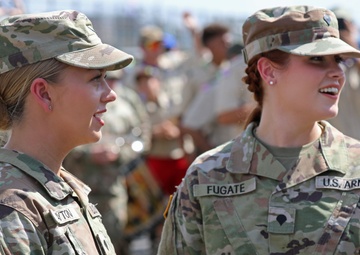 Army Reserve Soldier and country music star Craig Morgan performs the National Anthem alongside the 313th Army Band at the YellaWood 500