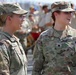 Army Reserve Soldier and country music star Craig Morgan performs the National Anthem alongside the 313th Army Band at the YellaWood 500