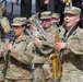 Army Reserve Soldier and country music star Craig Morgan performs the National Anthem alongside the 313th Army Band at the YellaWood 500