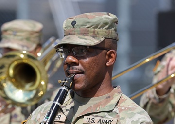 Army Reserve Soldier and country music star Craig Morgan performs the National Anthem alongside the 313th Army Band at the YellaWood 500