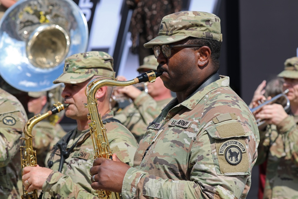 Army Reserve Soldier and country music star Craig Morgan performs the National Anthem alongside the 313th Army Band at the YellaWood 500