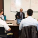 Former Secretary of Defense Leon Panetta meets with students in the Department of Defense Analysis Command and Leadership course