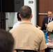 Former Secretary of Defense Leon Panetta engages with students